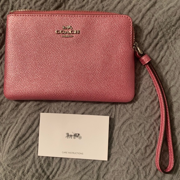 Coach Handbags - Metallic Pink Coach Wristlet
